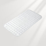 White bath mat with textured surface on a light gray background