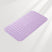Purple bath mat with textured surface on a light gray background