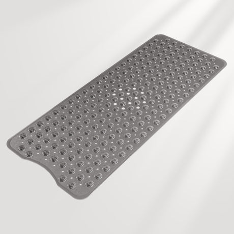 Gray textured bath mat on a light gray background