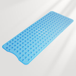 Blue textured bath mat on a light gray background