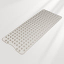 Rectangular bath mat with textured surface on a light gray background