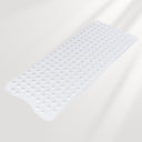 Clear bath mat with textured surface on a light gray background