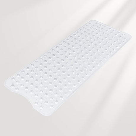 Clear bath mat with textured surface on a light gray background