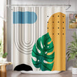 Shower curtain with abstract leaf design in a bathroom setting