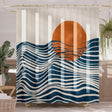 A shower curtain featuring an abstract design with geometric shapes and leaf patterns in beige, black, green, and orange colors.