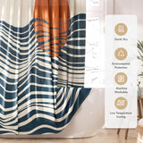 Boho shower curtain with a box detailing care instructions.