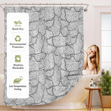 Shower curtain with black floral pattern and product features on the side, in a bathroom setting.
