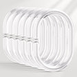 Set of clear plastic rings on a light gray background