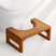 Wooden step stool on a white background