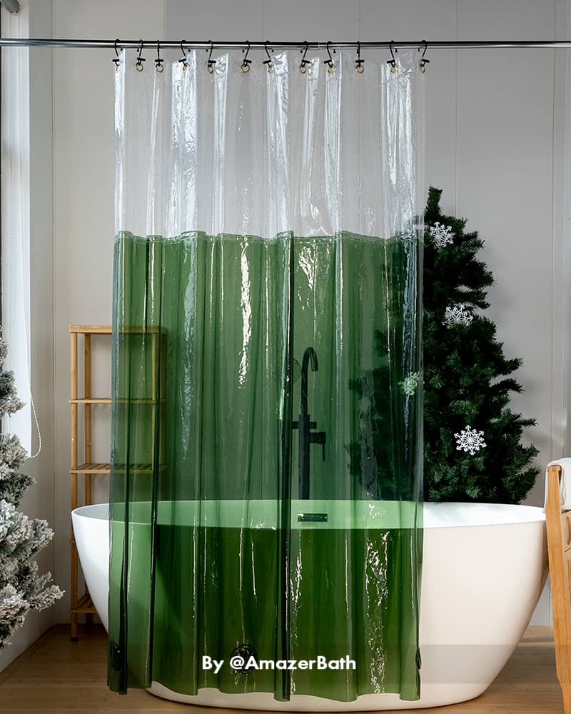 AmazerBath green color-block Sun EVA shower curtain liner hanging around a freestanding tub with black fixtures.