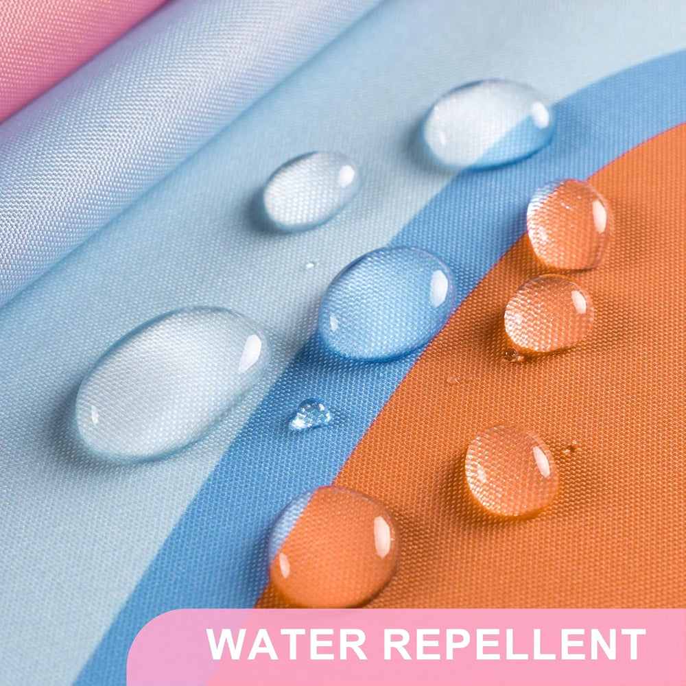 Water droplets on water-repellent fabric with 'WATER REPELLENT' text.