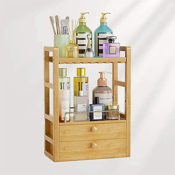 AmazerBath bamboo countertop vanity organizer holding skincare bottles, brushes, and bathroom essentials