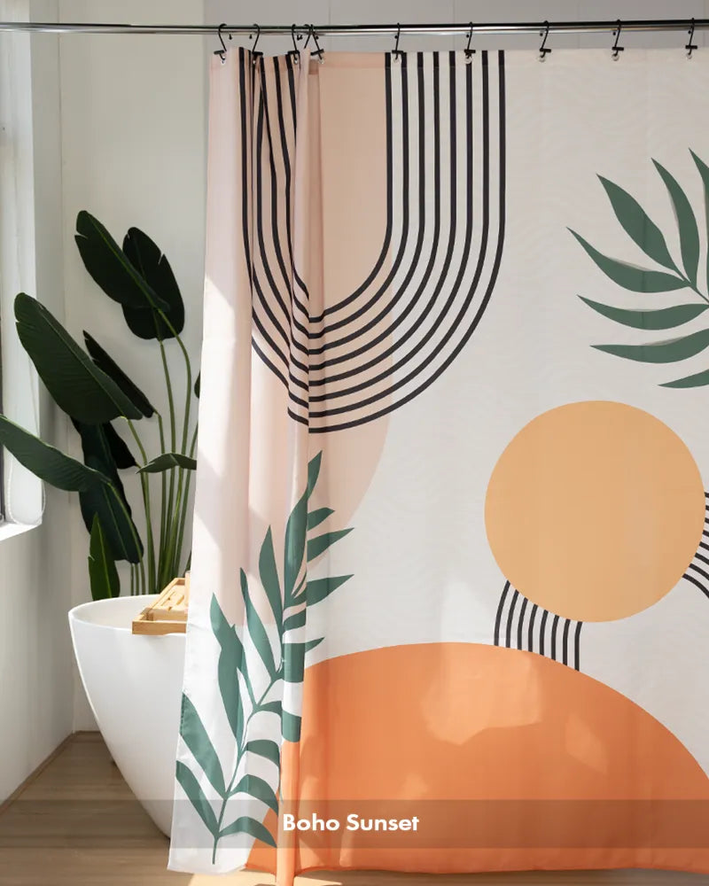 Customer bathroom photo showing a boho Sunset shower curtain with 12 rings, displayed as a complete curtain set.