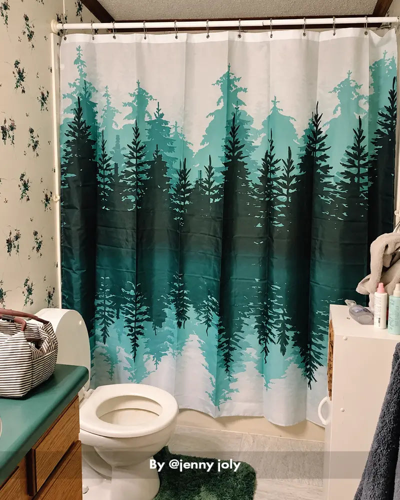 AmazerBath green forest shower curtain with 12 rings enclosing a bathtub in a nature-inspired bathroom scene.