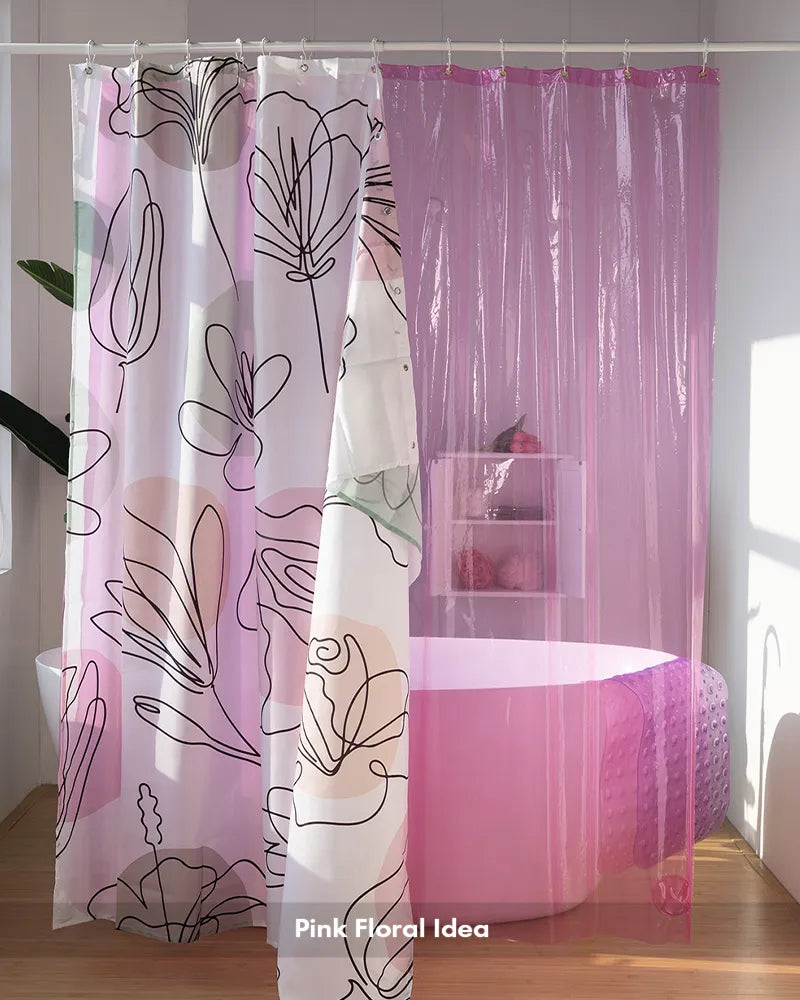 AmazerBath pink floral shower curtain with 12 rings and sheer color-block panels surrounding a freestanding tub.