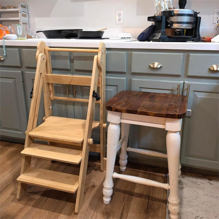 Wooden step ladder and small wooden table in a kitchen setting