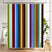 Colorful striped shower curtain in a bathroom setting