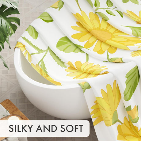 Floral-patterned fabric draped over a white bowl with 'SILKY AND SOFT' text.