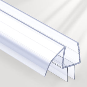 Clear plastic seamless glass door seal strip with a U-shaped profile on a white background