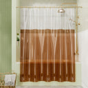 Clear shower curtain with brown pattern in a bathroom setting
