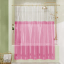 Clear shower curtain with pink bottom section in a bathroom setting