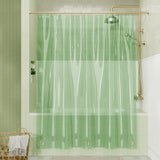 Green shower curtain with gold fixtures in a bathroom setting