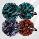 Four bath poufs in green, red, blue, and black with 'nazerBath' branding on a white background.