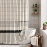 Striped shower curtain with black band in a bathroom setting