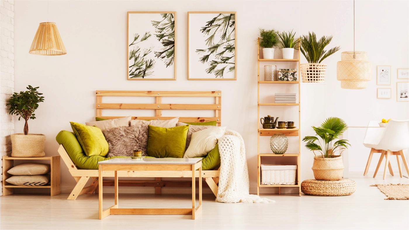 Modern living room with wooden furniture, plants, and decorative items.