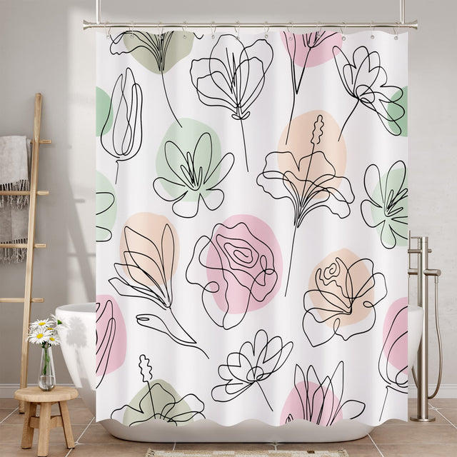 Shower curtain with abstract floral design in pink, green, and beige on a white background.
