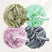 Four bath poufs in green, pink, gray, and mint with 'amazerBath' branding on a white background.