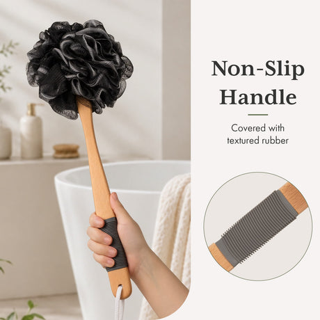 Black loofah with a wooden handle held by a hand, with text highlighting the non-slip handle.