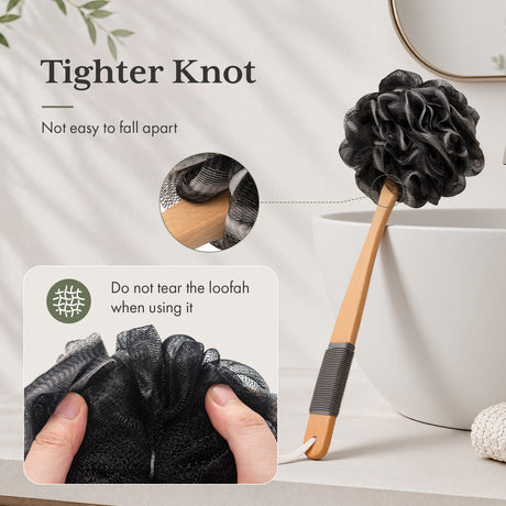 Black loofah with wooden handle and text on a neutral background