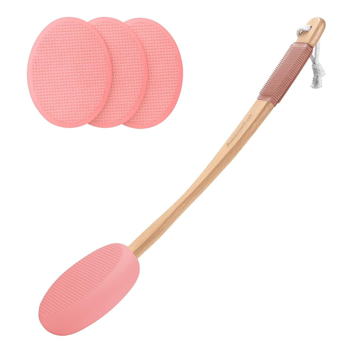 Pink silicone scrubber with wooden handle and three additional pink pads on a white background