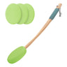 Spatula with green silicone heads on a white background