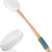 Two exfoliating brushes with wooden handles on a white background