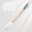 Fly swatter with three fly swatter heads on a light gray background
