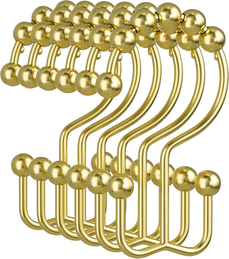 Set of gold hooks on a white background