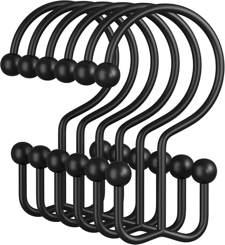 Set of black hooks with spherical ends on a white background