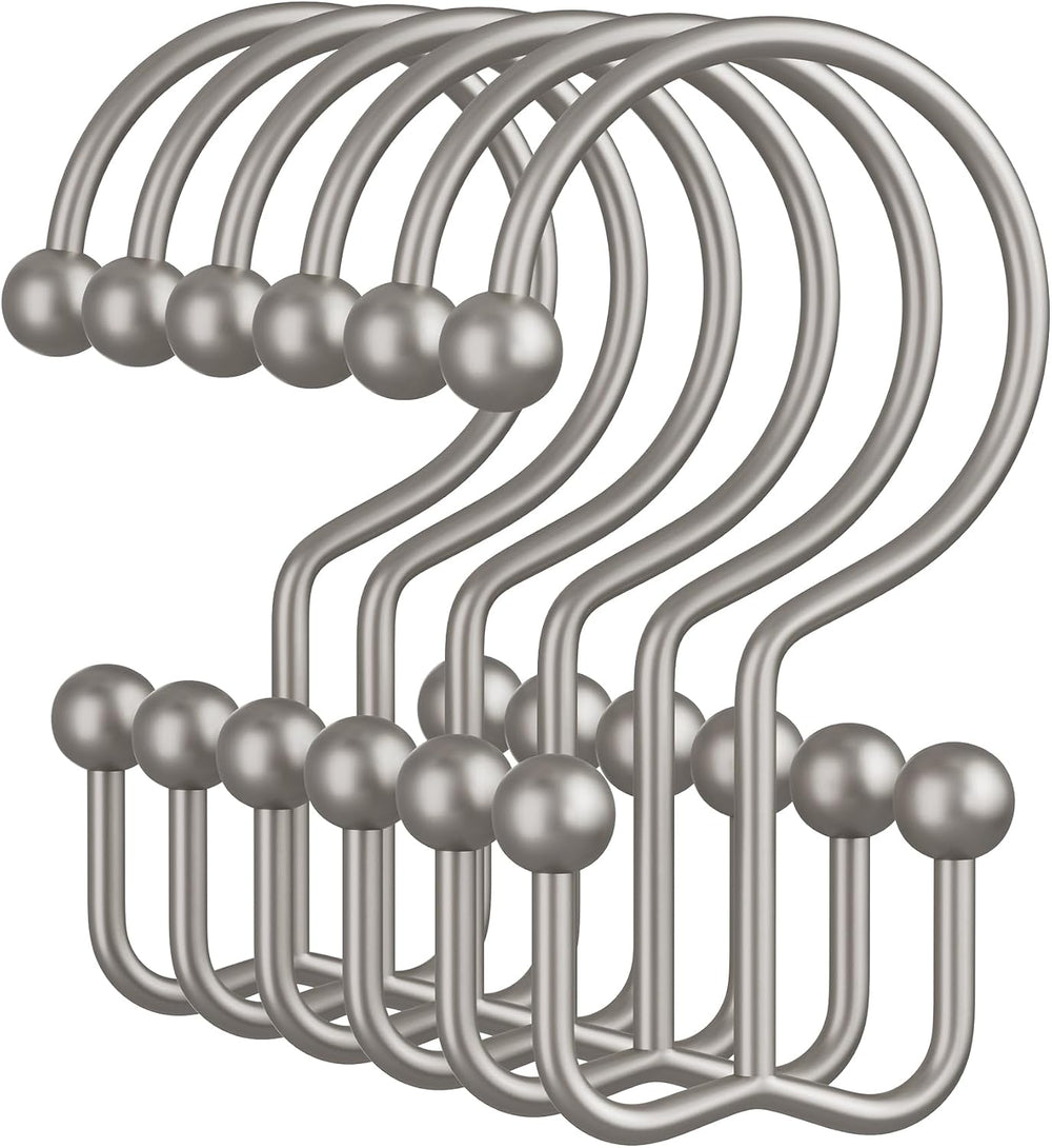 Set of silver hooks on a white background