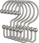 Set of silver hooks on a white background