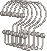 Set of silver hooks on a white background