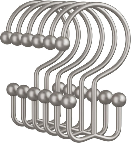 Set of silver hooks on a white background