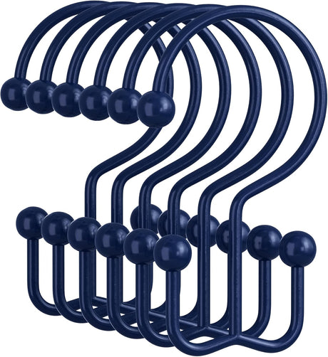 Set of navy blue hooks with spherical ends on a white background