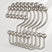 Set of metal hooks with spherical ends on a white background