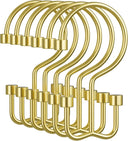 Set of gold hooks on a white background