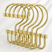 Set of 12 AmazerBath gold cylindrical metal shower curtain hooks displayed on a clean white background.