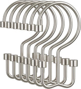 Set of metal hooks on a white background