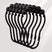 Set of black curtain hooks on a light gray background