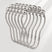 Set of silver curtain hooks on a white background